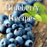 Luscious fresh Maine Blueberries on wood table top in rustic kitchen