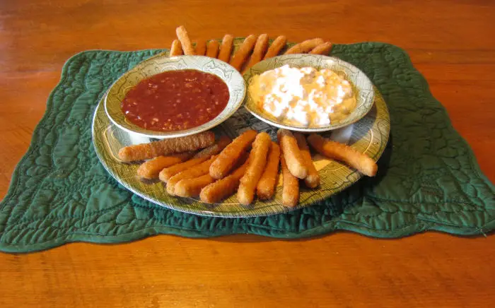 Two sauces - one savory and one sweet/sour served with Tyson Chicken Fries