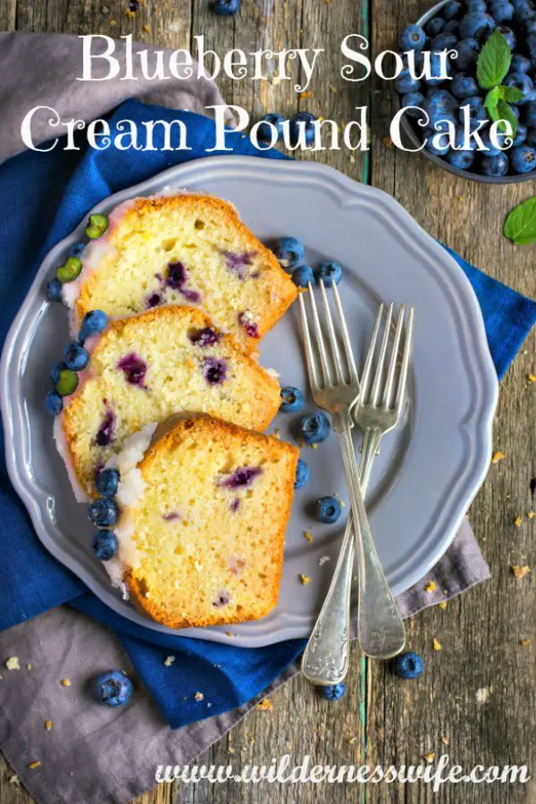 3 slices of Blueberry Sour Cream pound cake on a blue plate