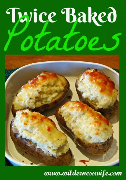 Twice baked potatoes in a Corningware roasting pan made from an easy twice baked potatoes recipe.