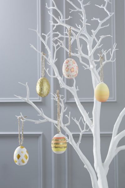 White branch serving as Easter Egg Tree