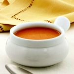 steaming bowl of creamy tomato bisque soup