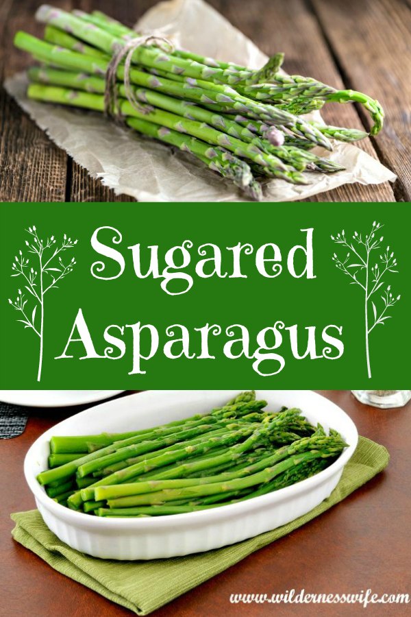 Fresh asparagus on a cutting board being trimmed to fit saute pan.