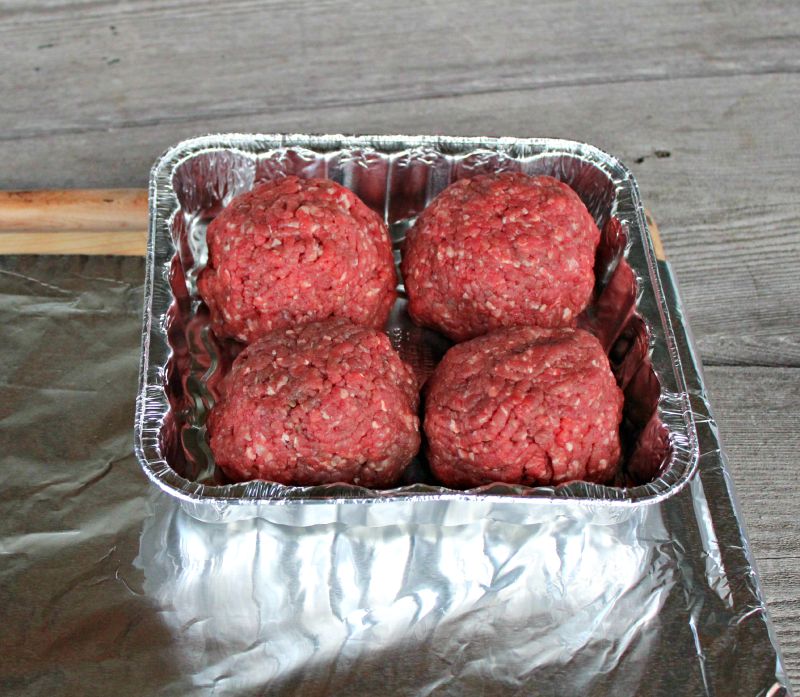 Step 1 of making a beer can hamburger is to shape the hamburg in to a ball and chill.