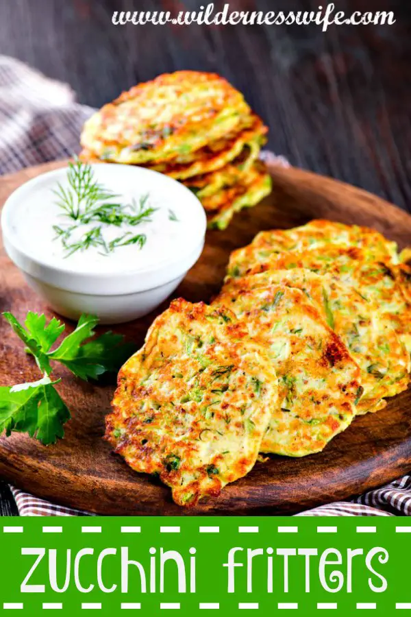 Delicious Zucchini Fritters Recipe drenched in a smooth Dill & Chive Sour Cream Sauce....yummy!