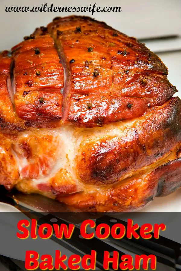 A beautiful mahogany glazed baked ham cooked in the slow cooker.  The crockpot makes this ham moist & tender.