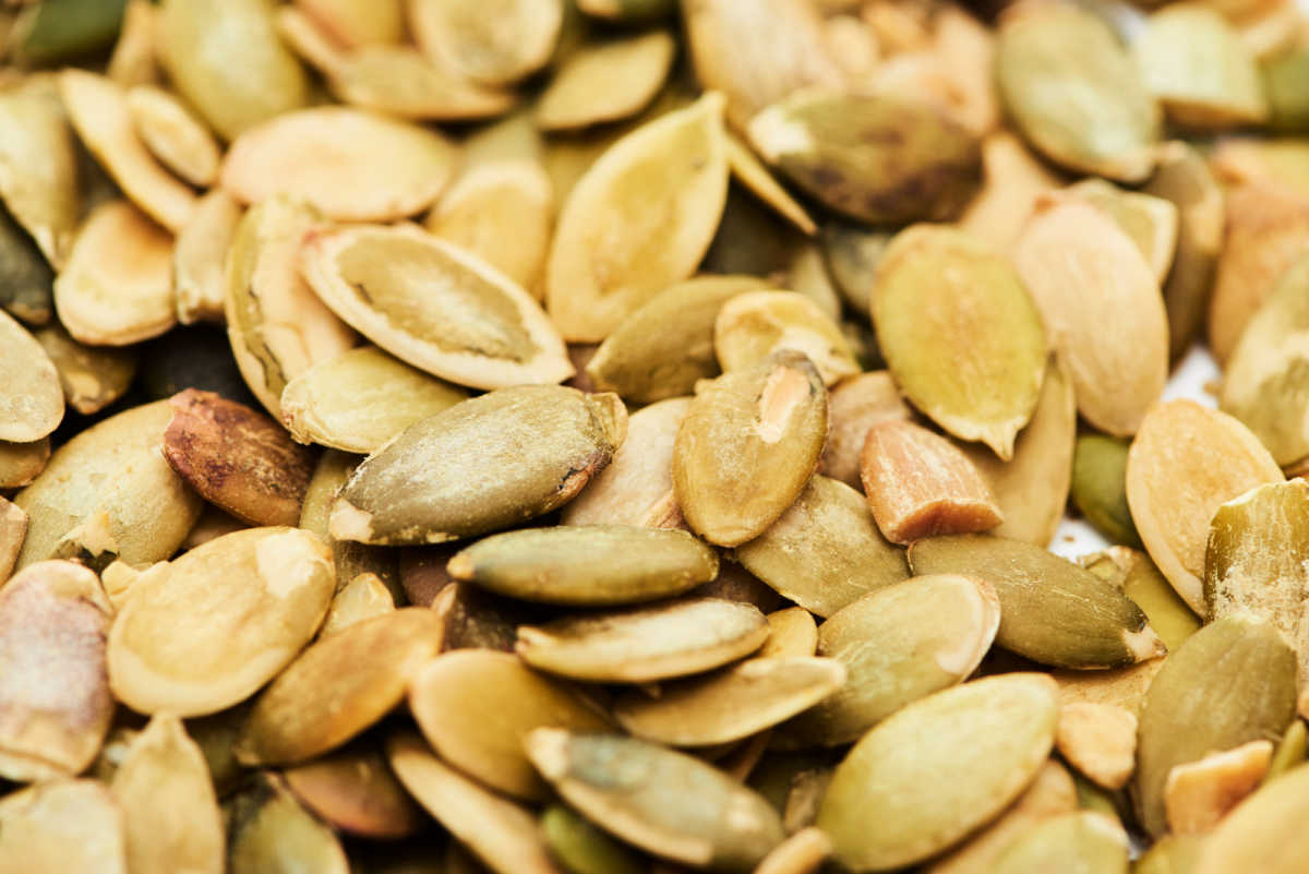 Close up of pumpkin seeds ready to be used in artisan bread recipe