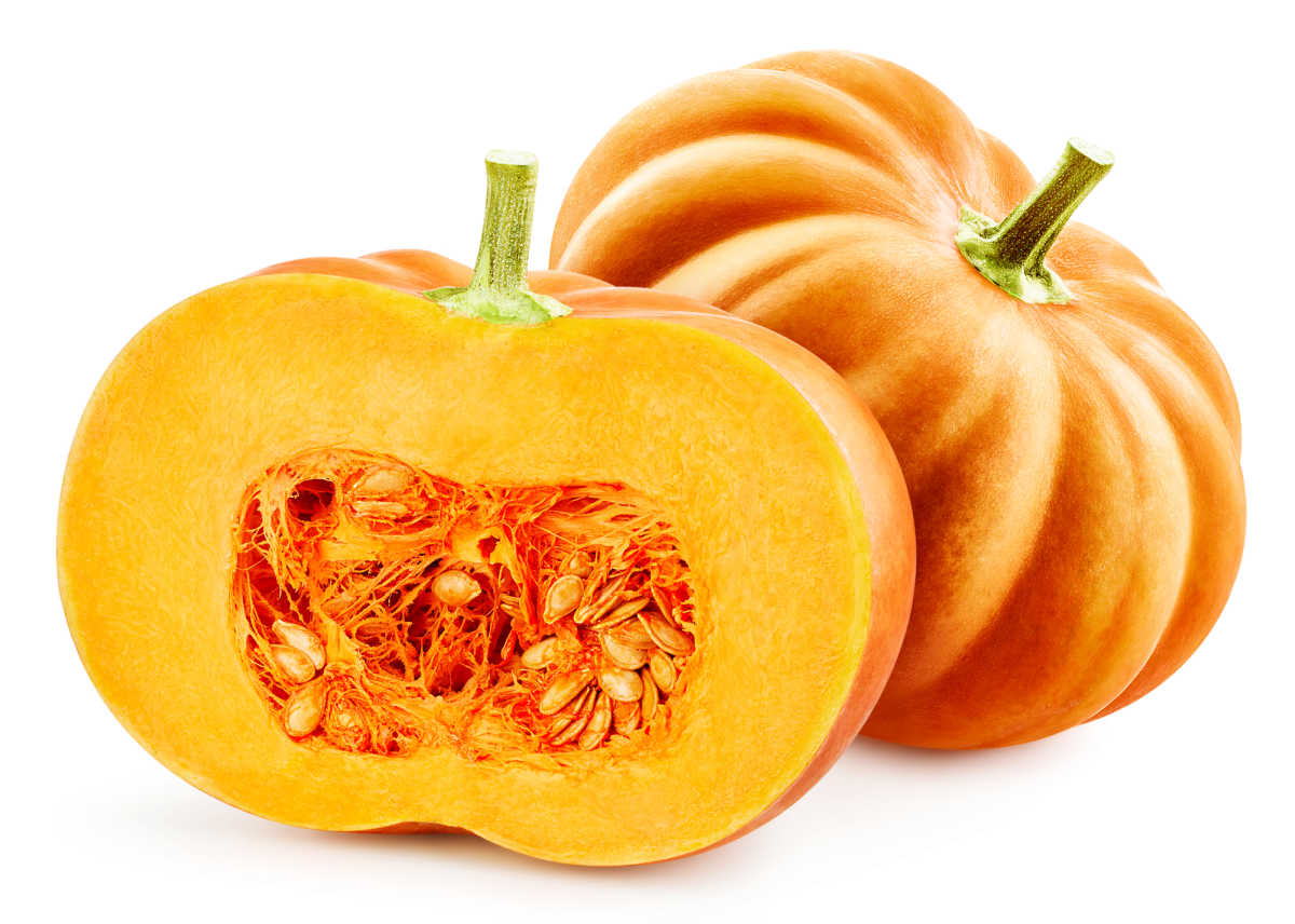 1 Whole pumpkin and one pumpkin cut in half with seeds exposed